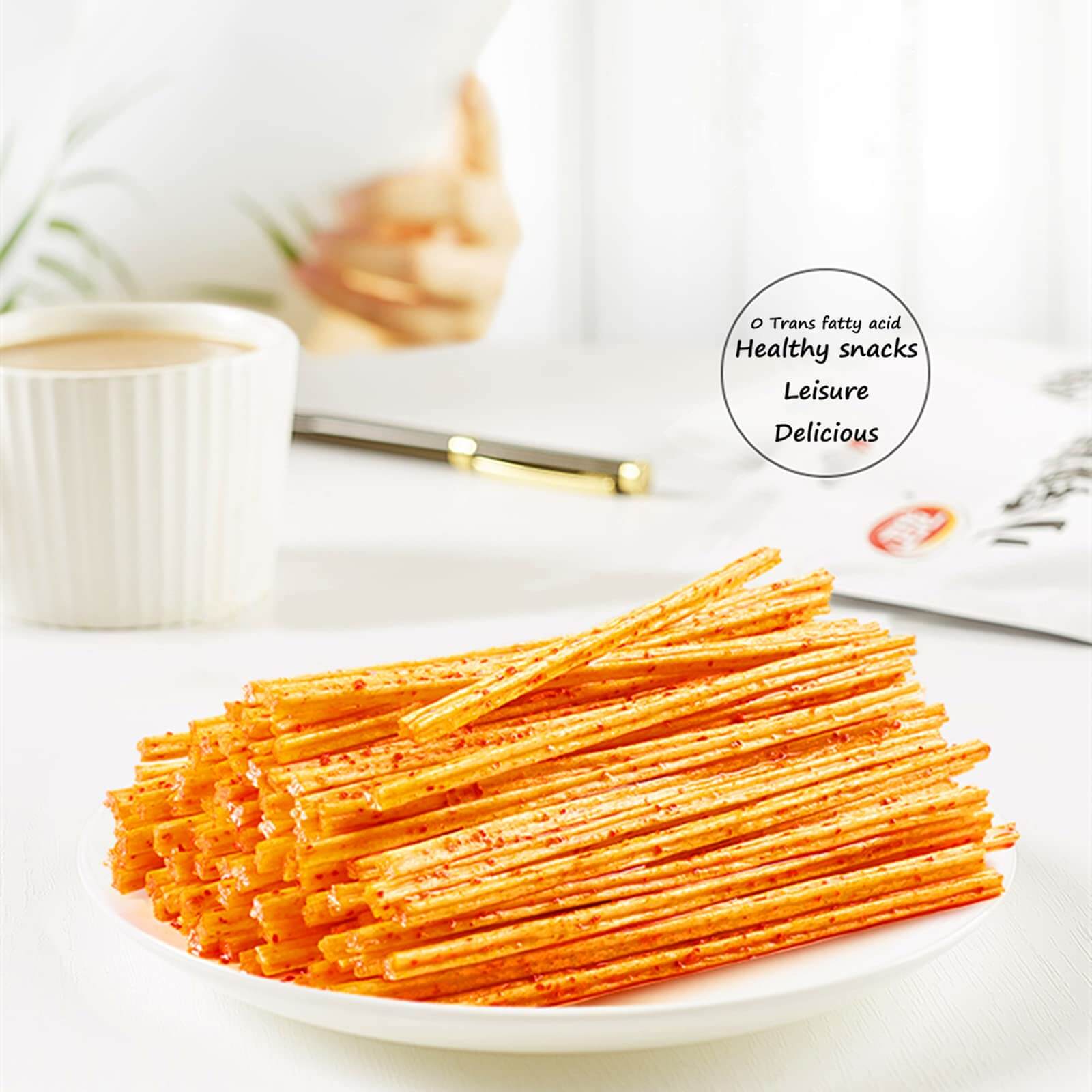 Chinese Spicy Latiao Gluten Strips served on a plate with coffee in the background, showcasing a delicious snack.